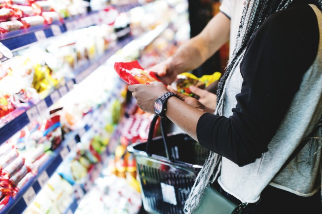 A couple shopping for food